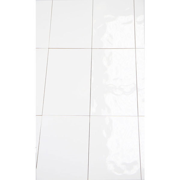 Bumpy white ceramic wall tile sample 